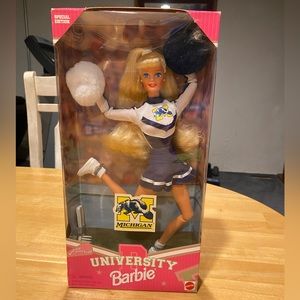 UofM cheerleading Barbie. Never been opened or played with.